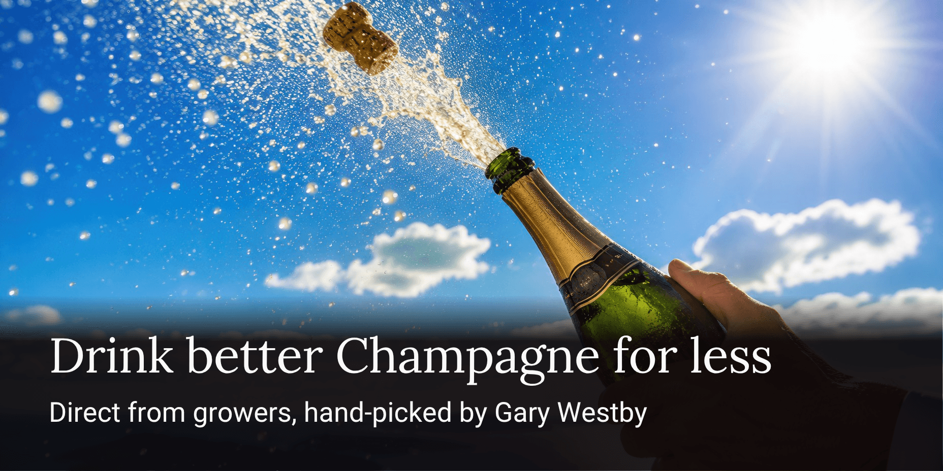 K&L's direct import grower Champagne program - Champagne spraying from a bottle against a blue sky